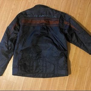 Brand NEW Harley Davidson windbreaker riding jacket. Very nice jacket.